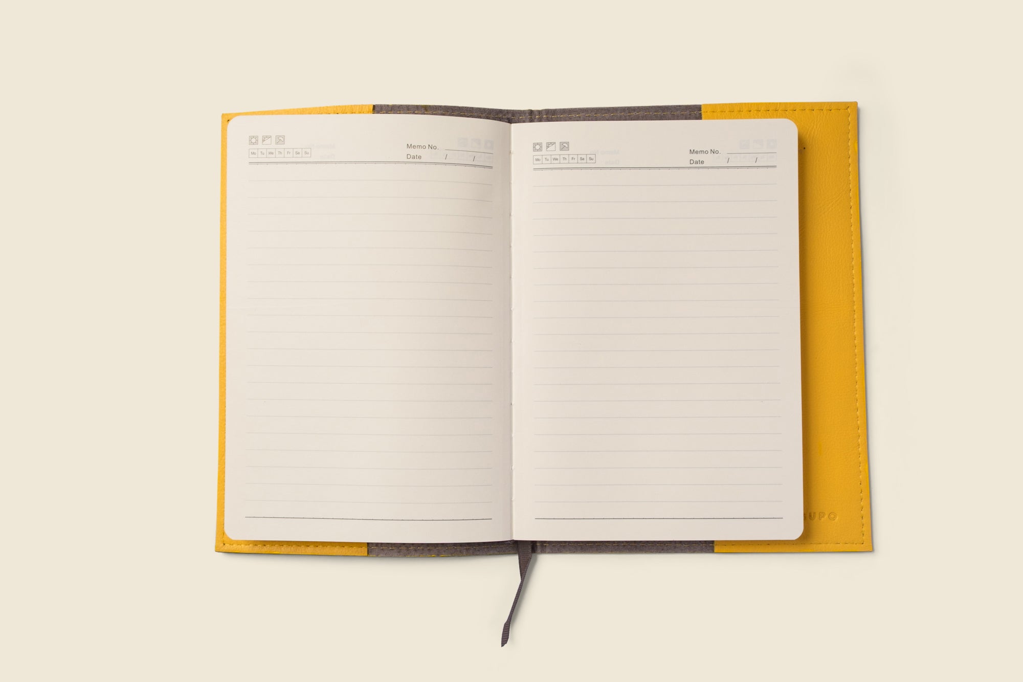 yellow leather notebook cover with lined notebook