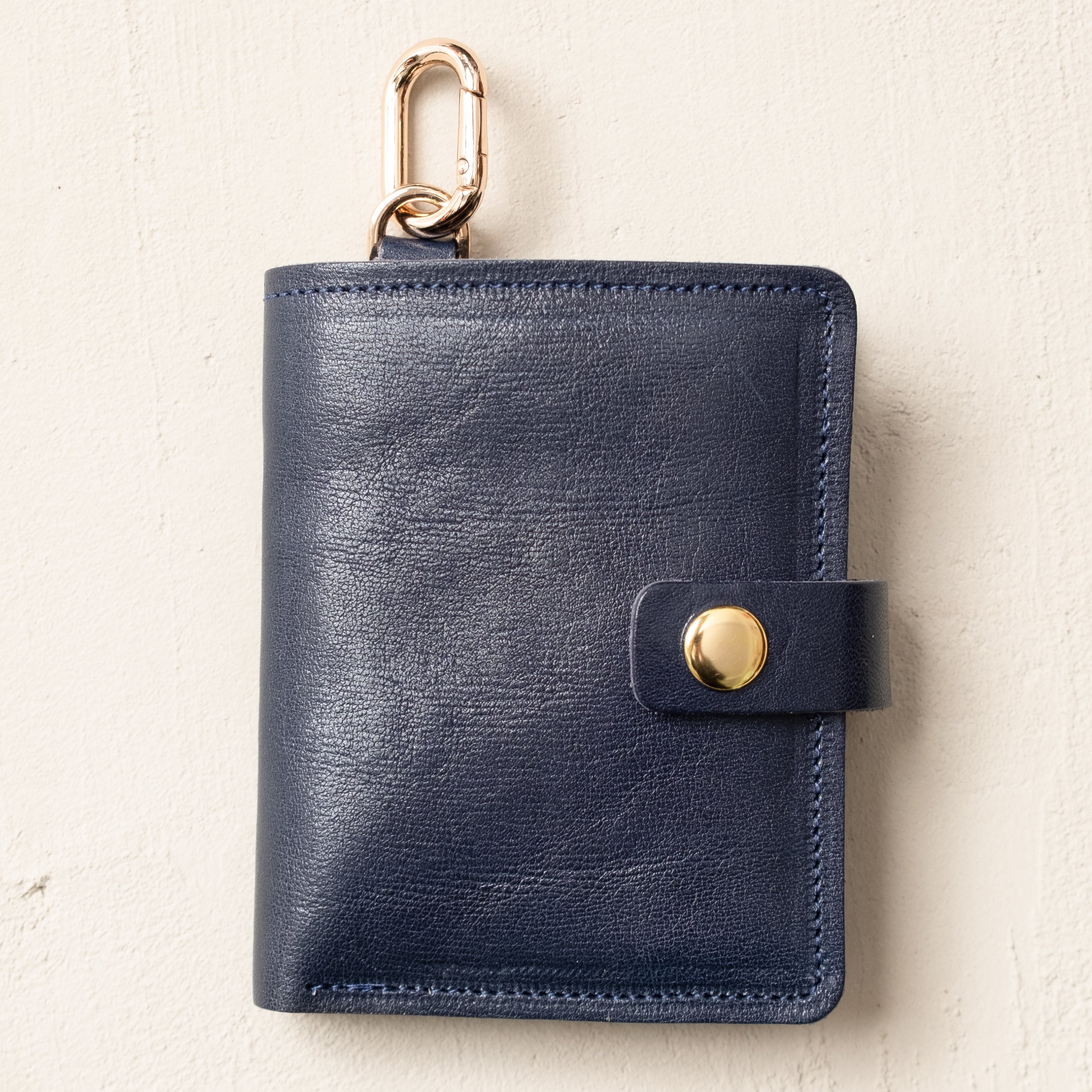 CASUPO marine blue snap wallet displaying card slot capacity