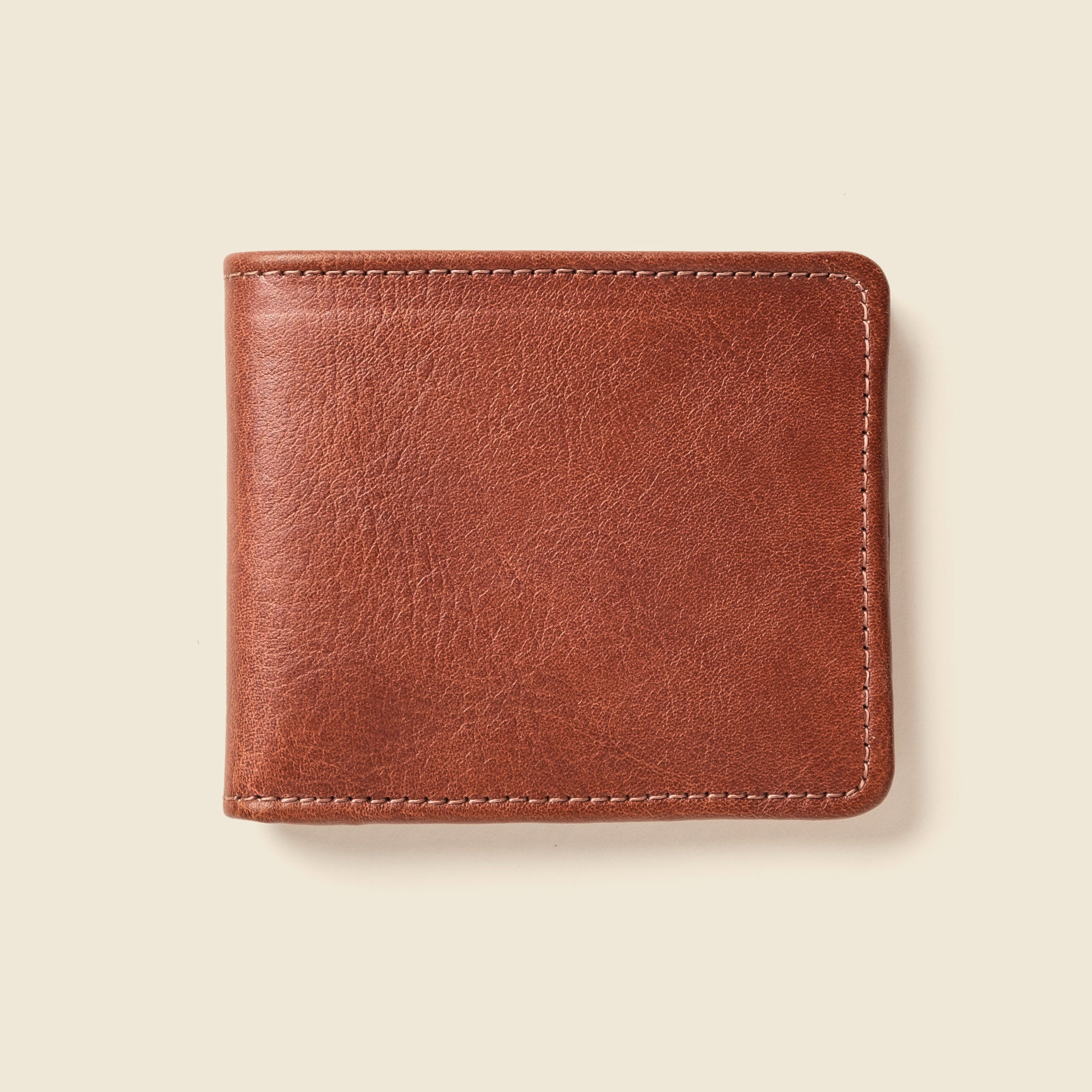 Someone holding Chocolate Large Billfold Wallet with RFID protection flat - Casupo