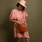 Brown leather crossbody bag with long strap for women
