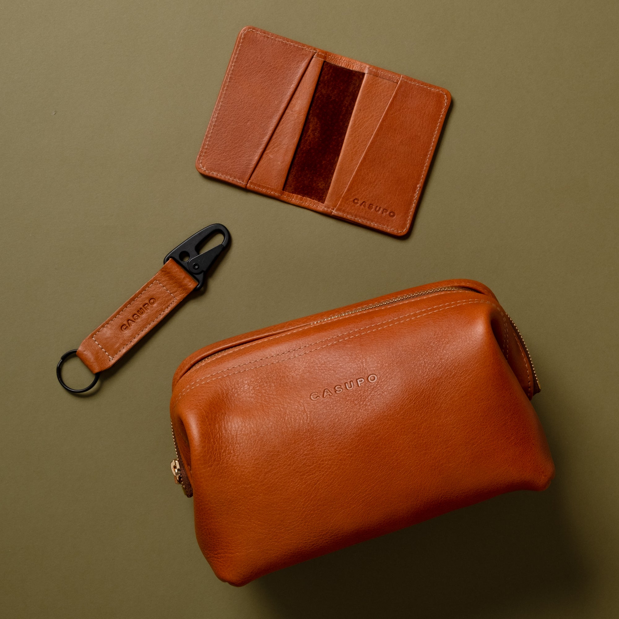 tan brown leather bundle of dopp kit, keychain, bifold wallet for gifting