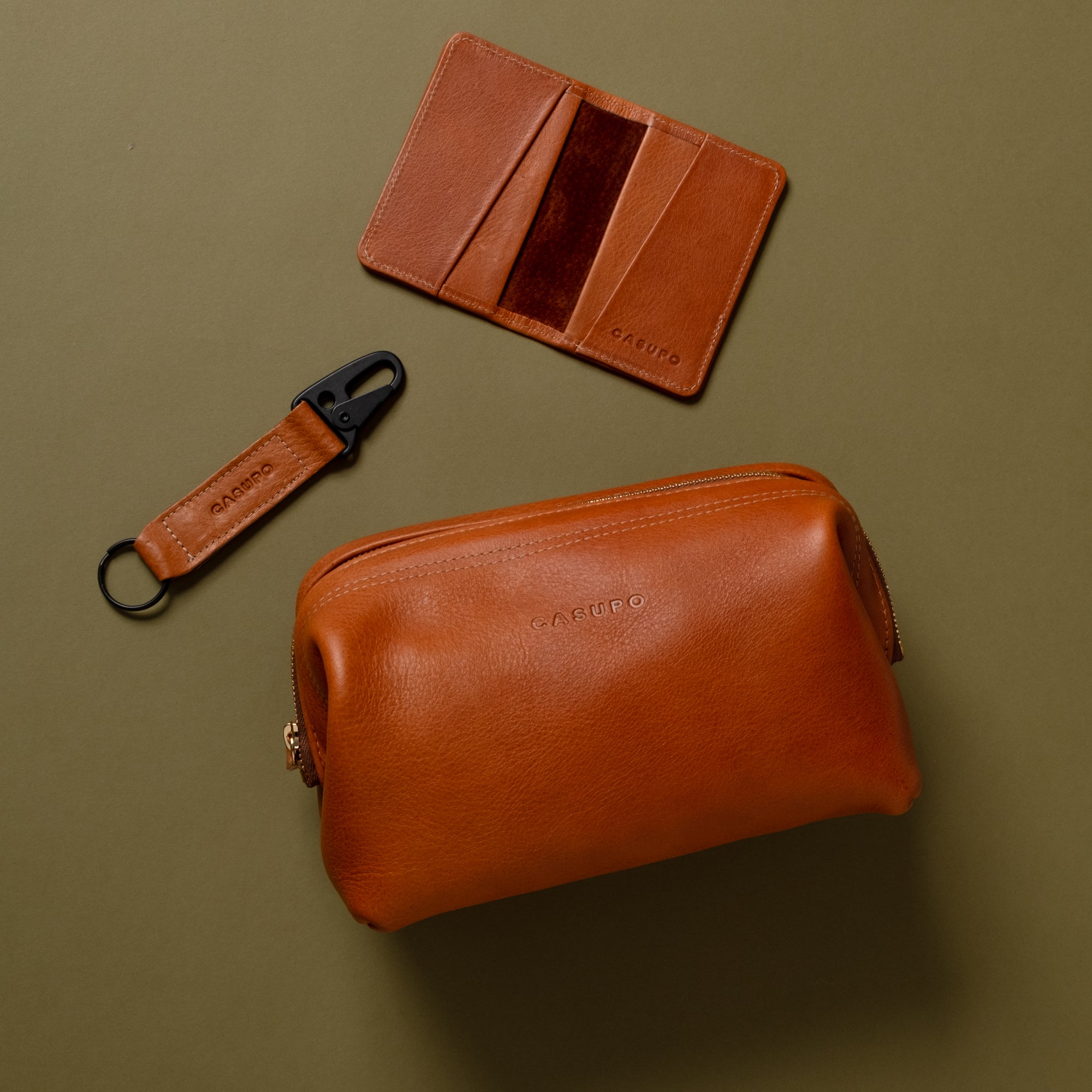 tan brown leather bundle of dopp kit, keychain, bifold wallet for gifting