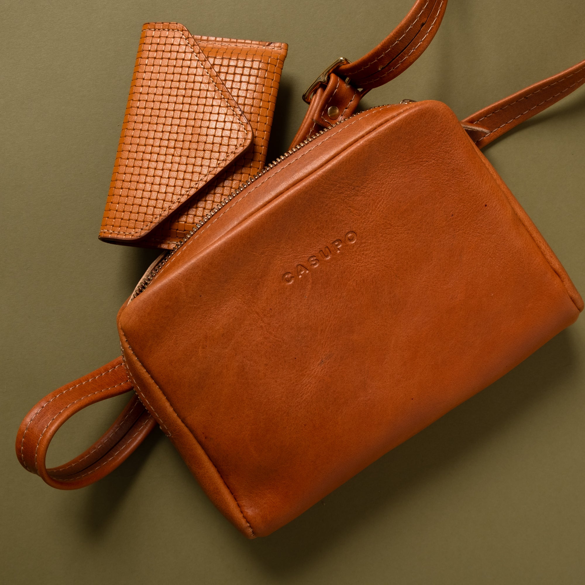 Tan brown fanny pack with envelope wallet
