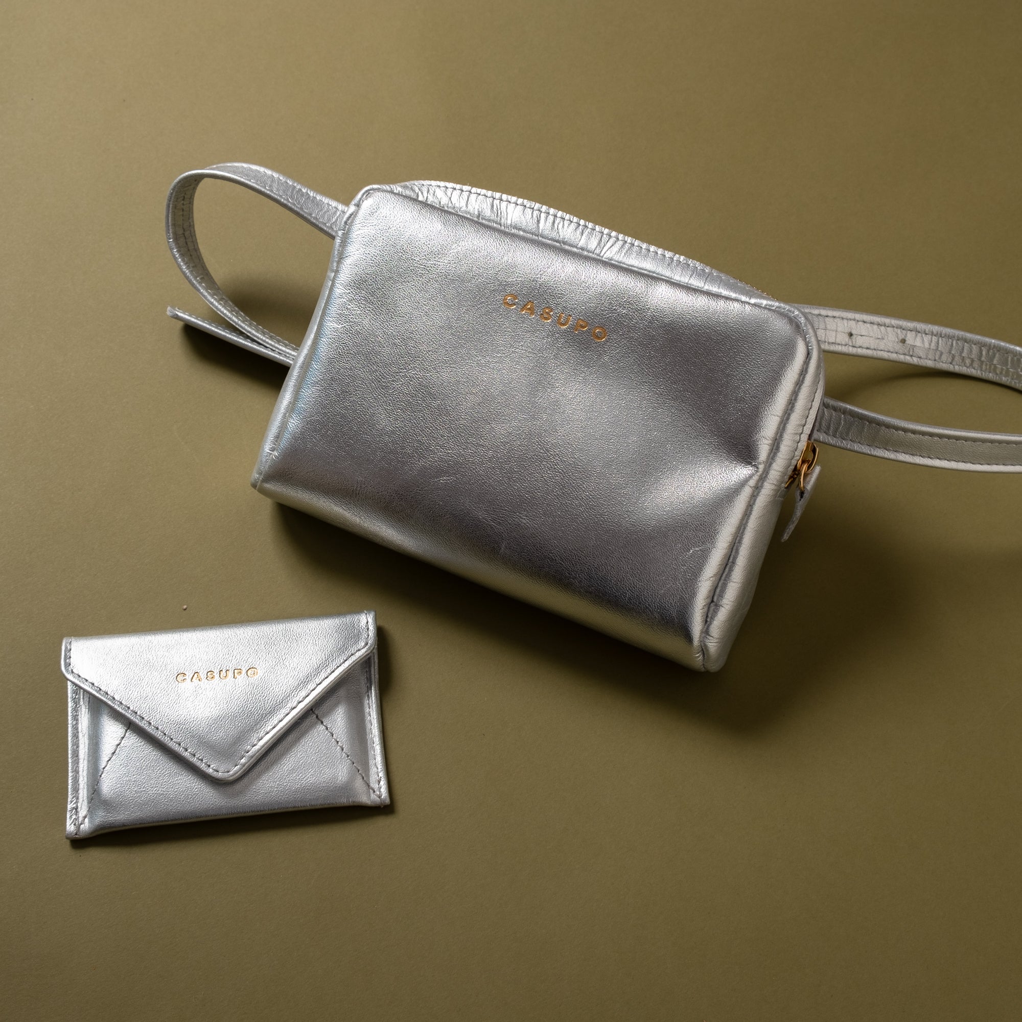 Silver fanny pack and envelope wallet for music festivals, coachella. 