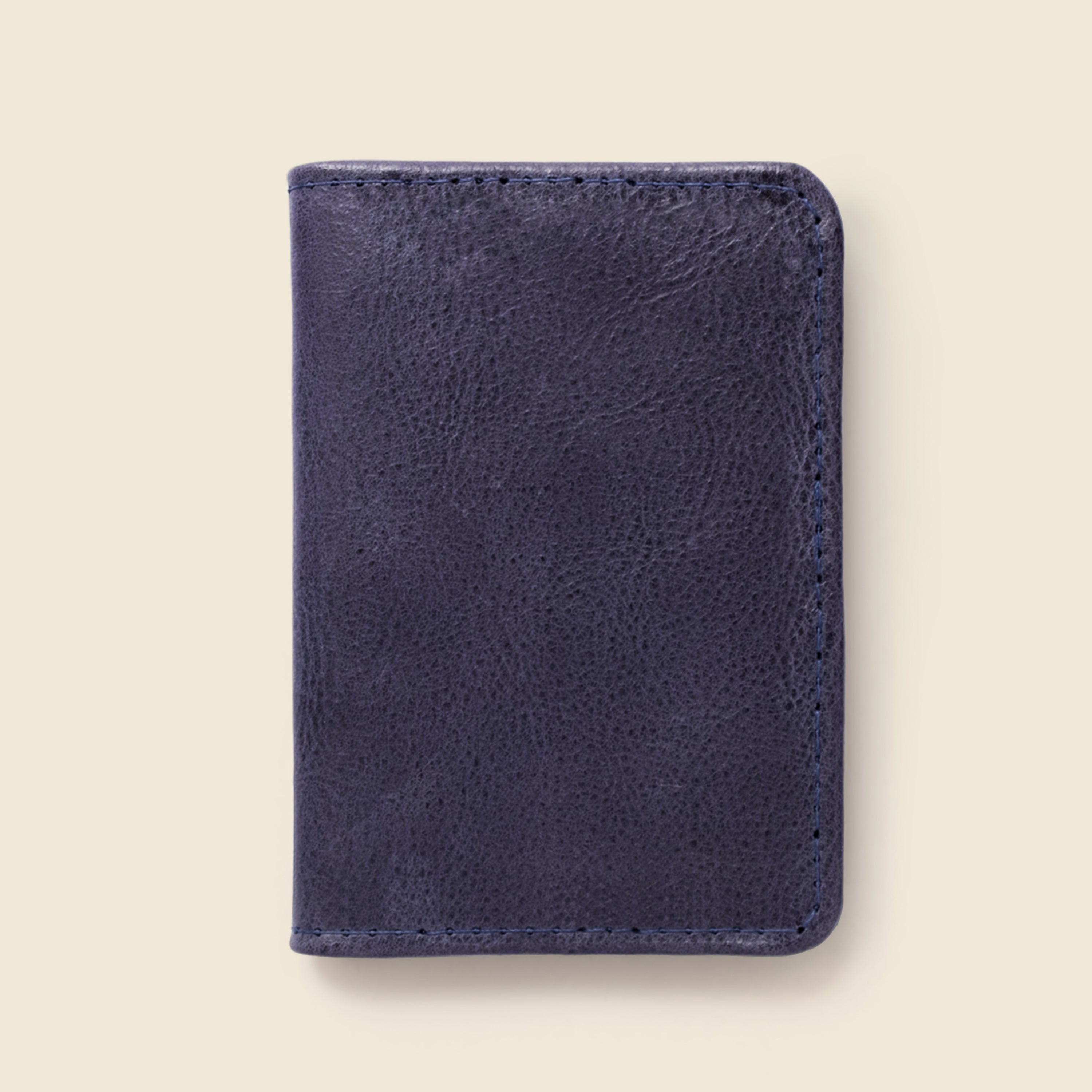 Indigo leather wallet on a white background