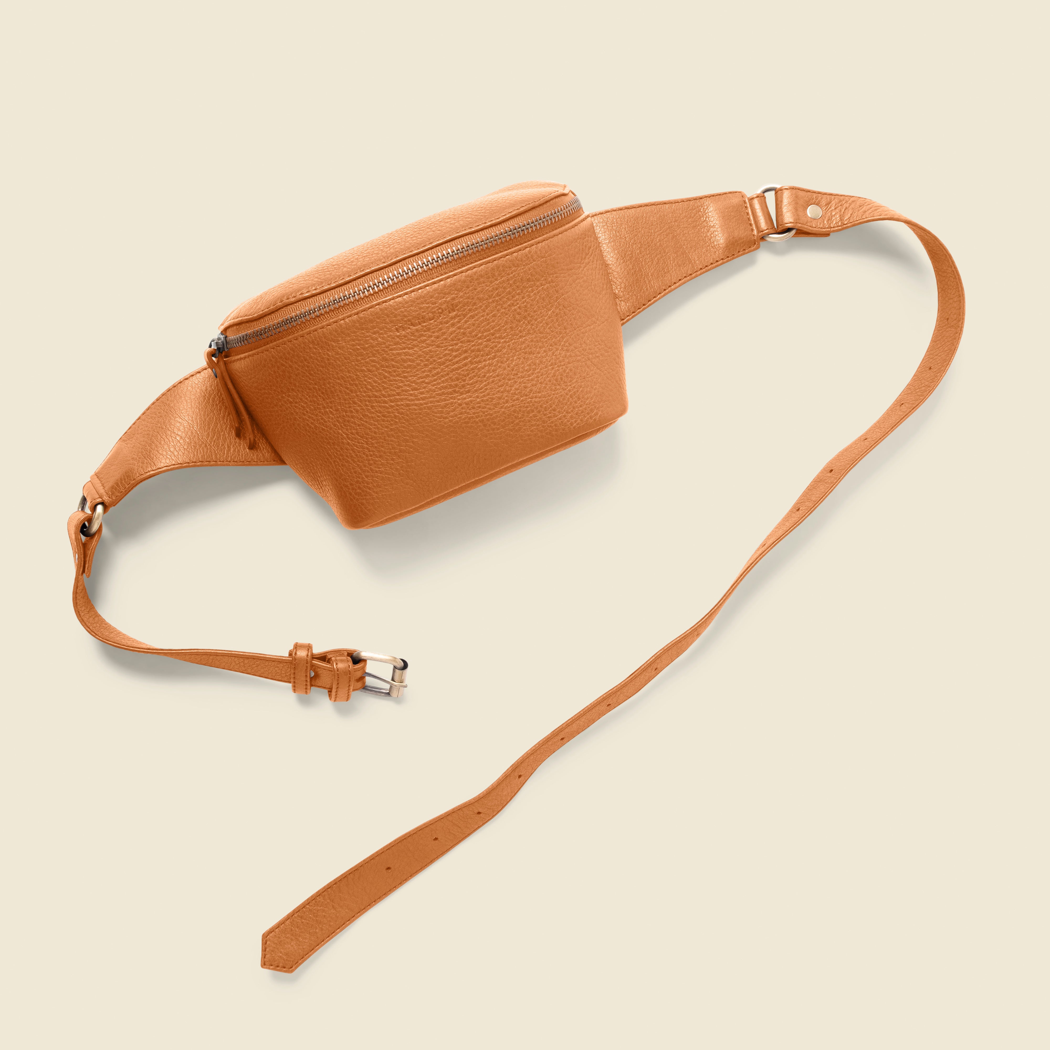tan leather fanny pack bag for private events and corporate gifts.