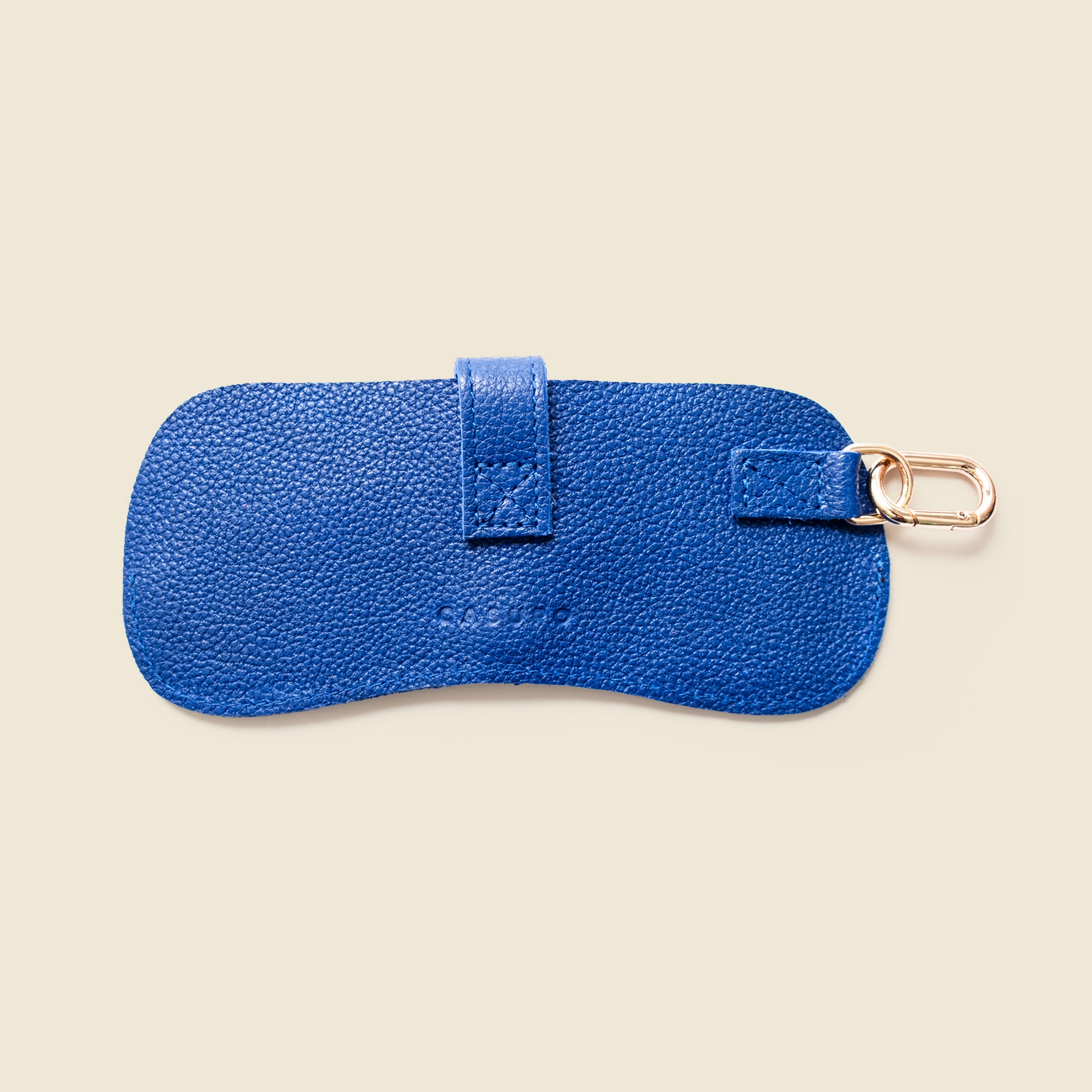 Blue leather keychain pouch on a white background