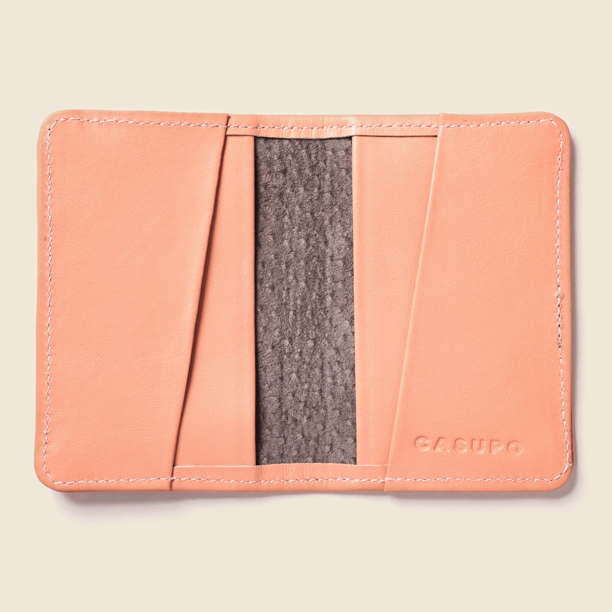 Pastel pink leather bifold wallet for cards and cash