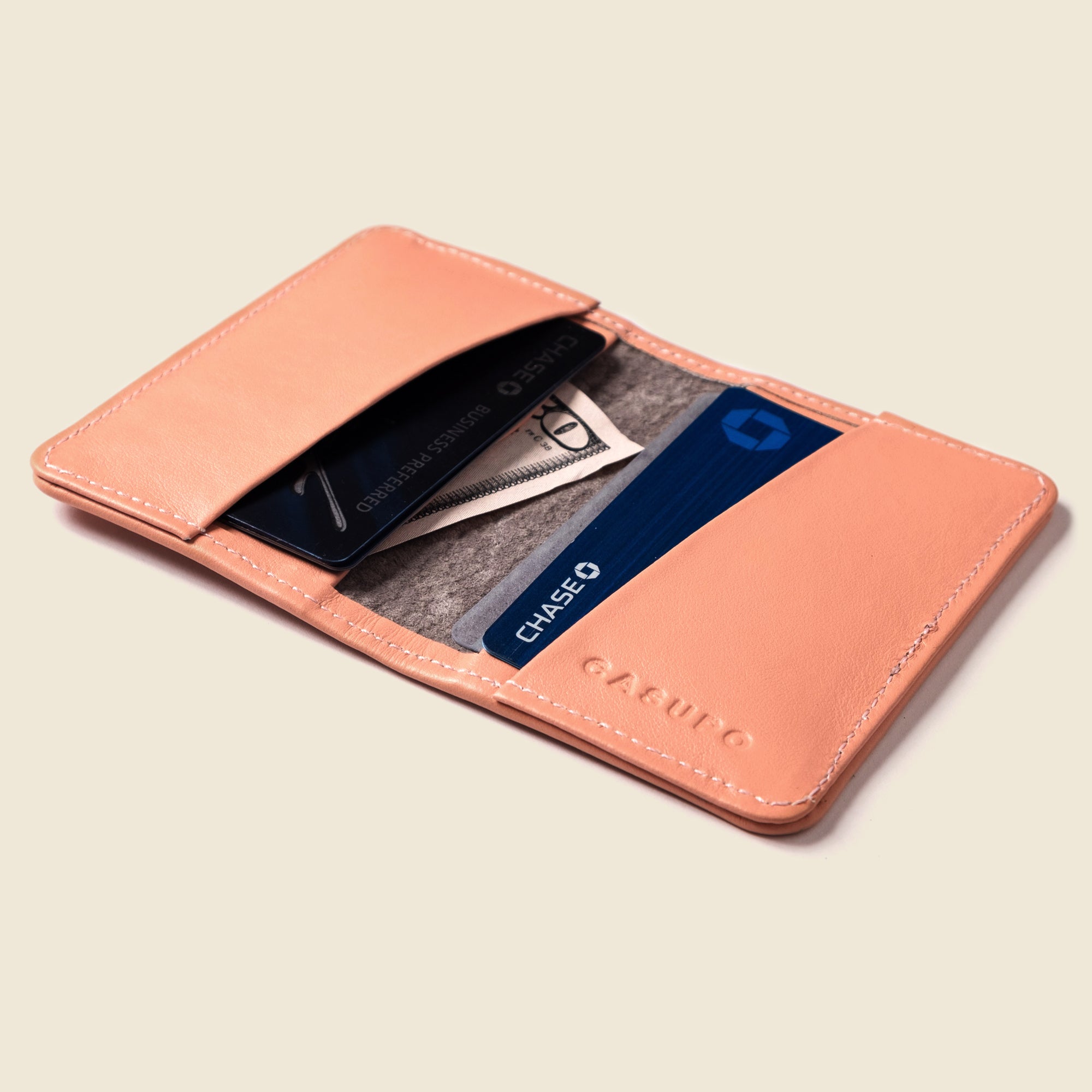 Pink leather bifold wallet for cards and cash