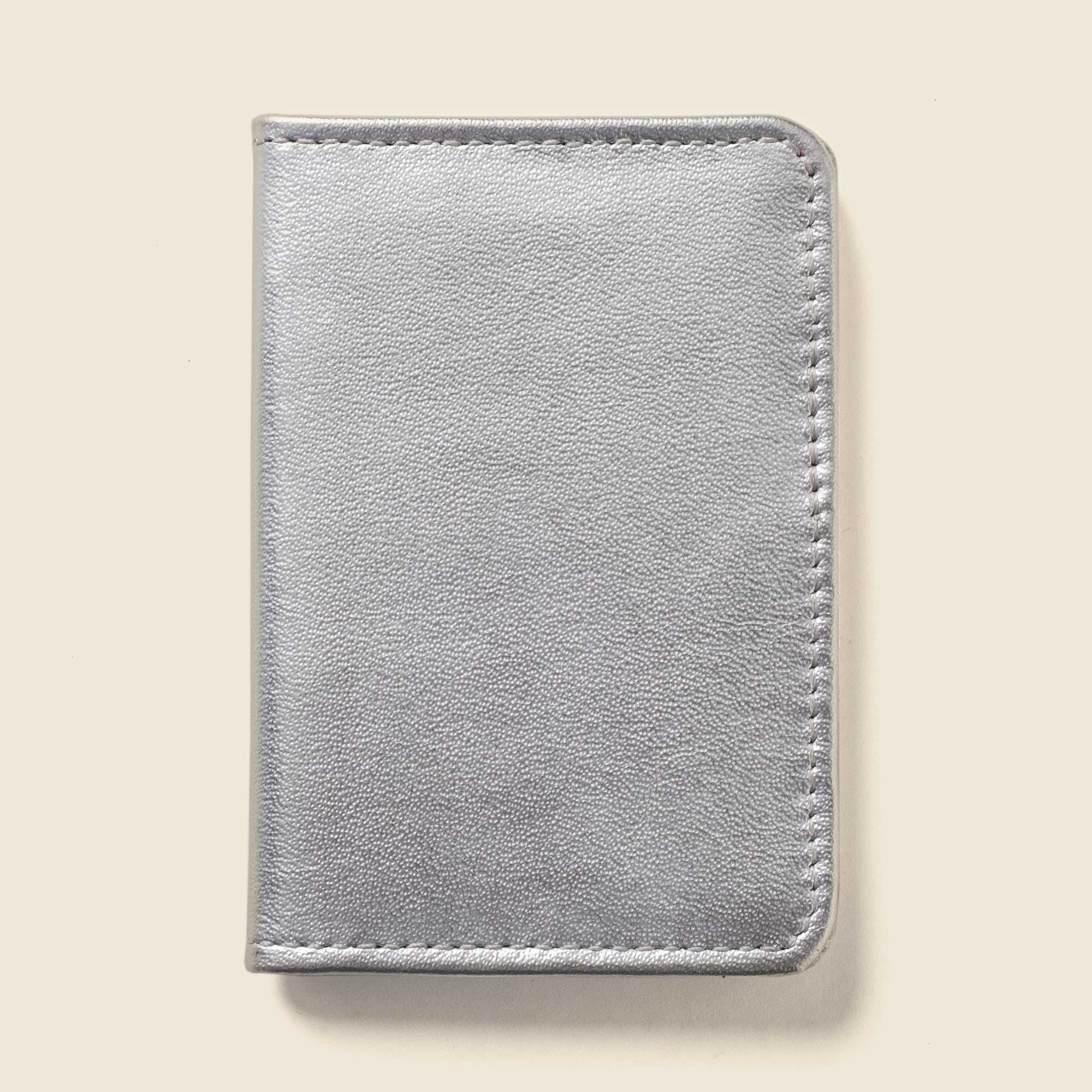 Silver leather bifold wallet from Casupo for women