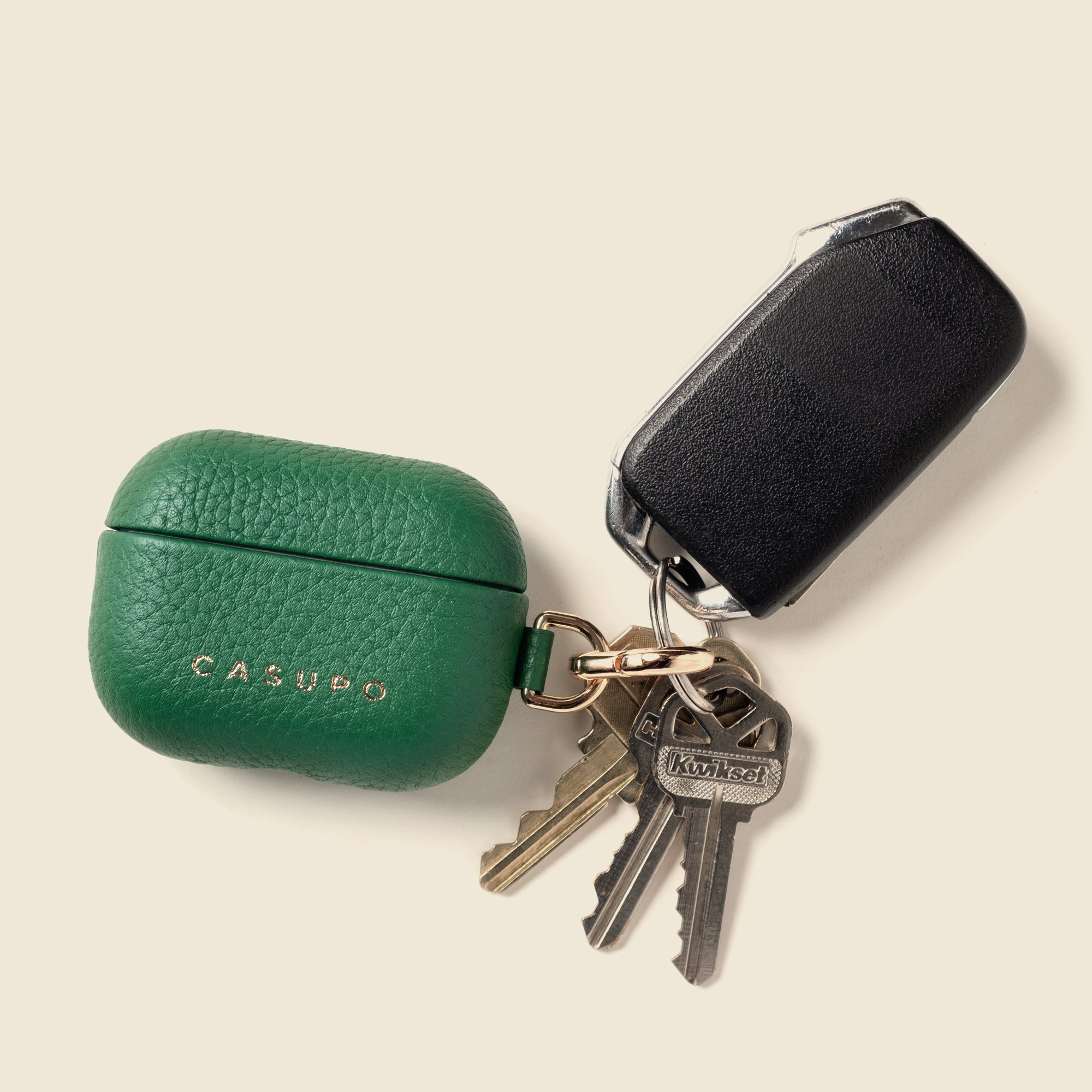 Green leather airpod case with key ring
