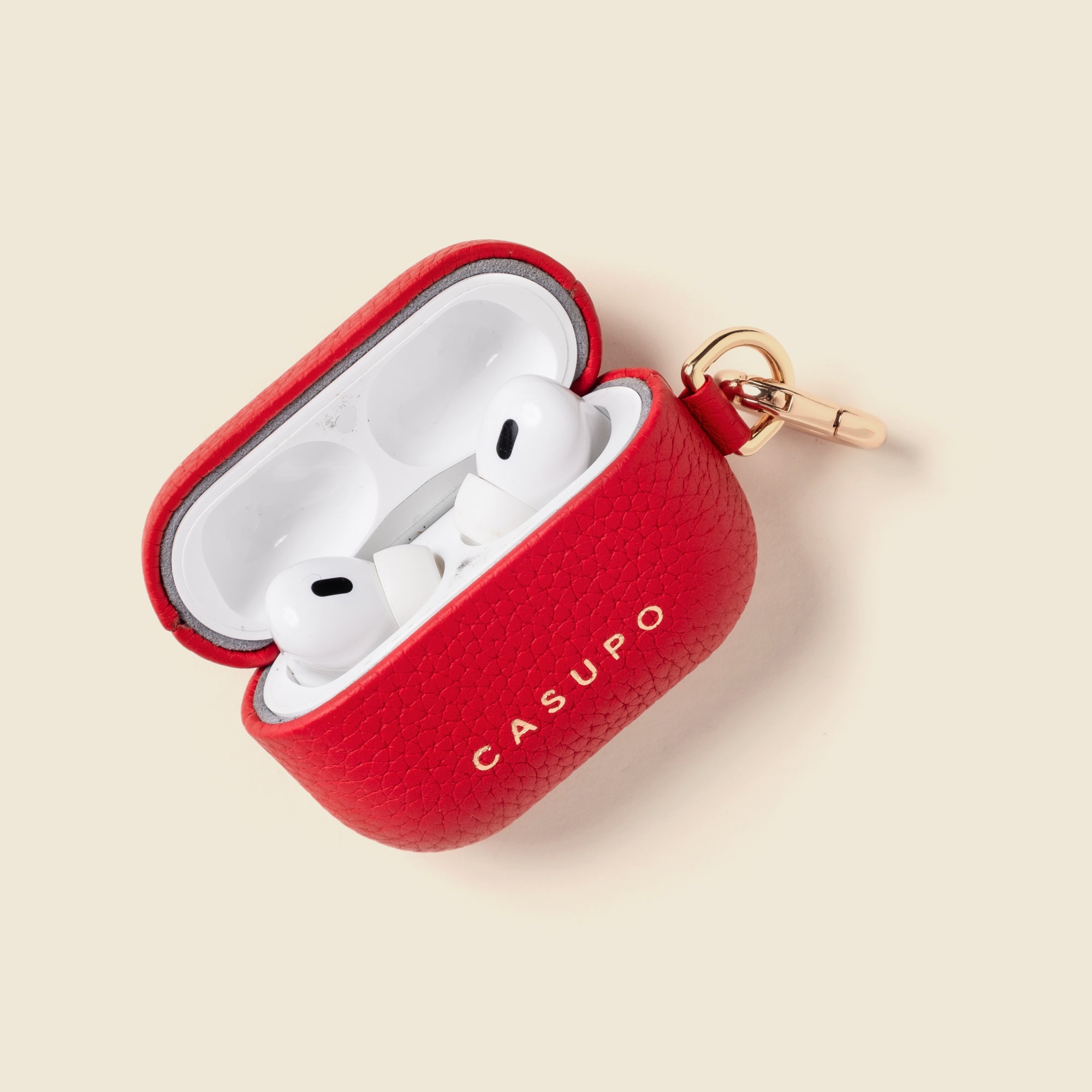 red leather airpod case with key ring