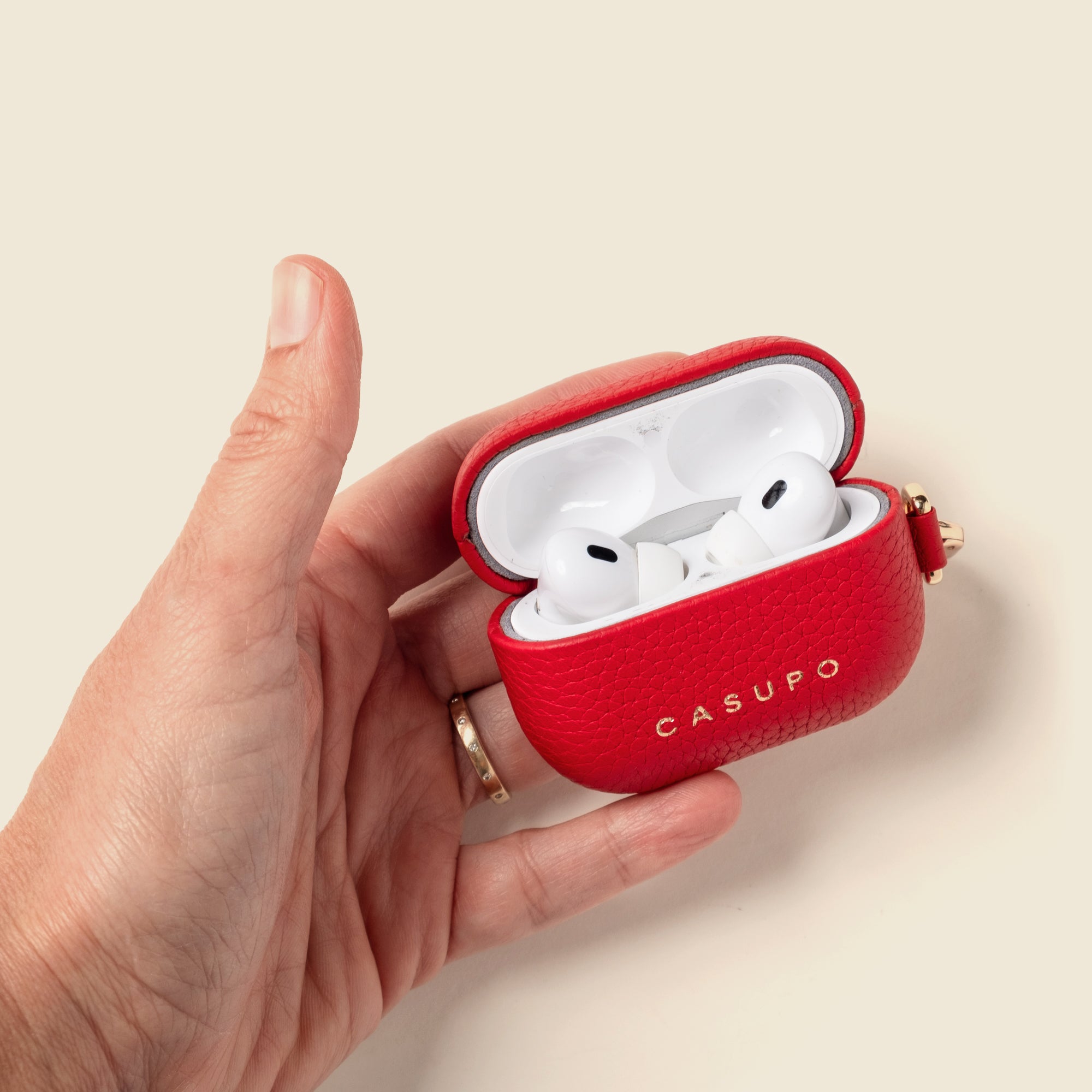 red leather airpod case with key ring