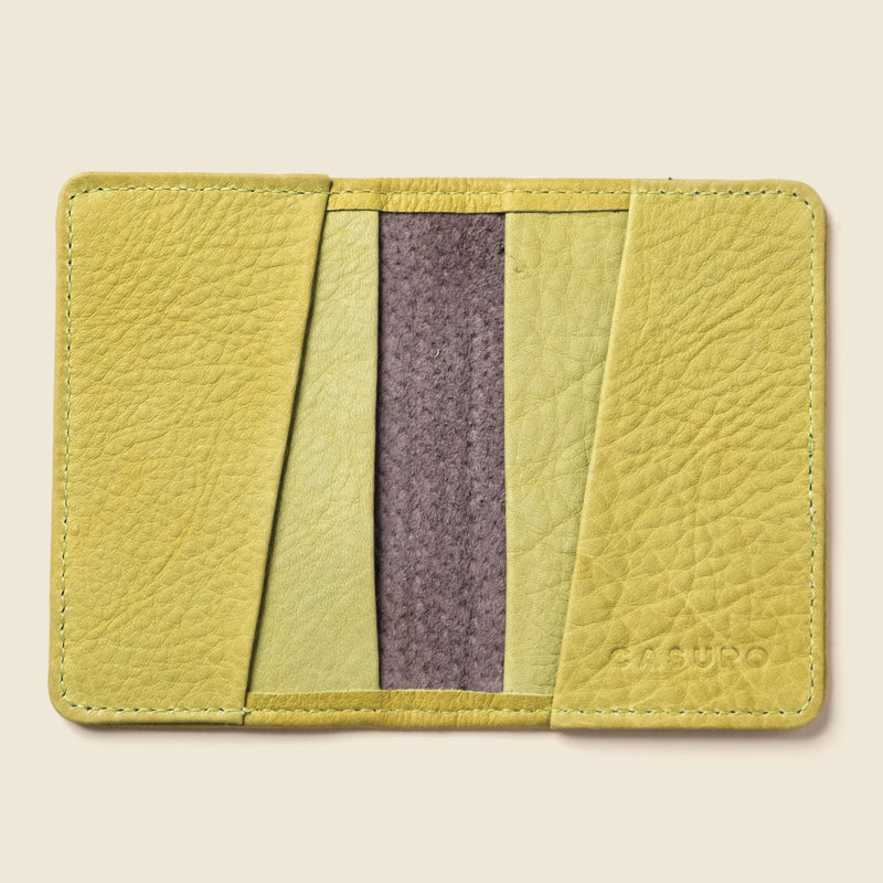 Green leather bifold cardholder with rfid protection