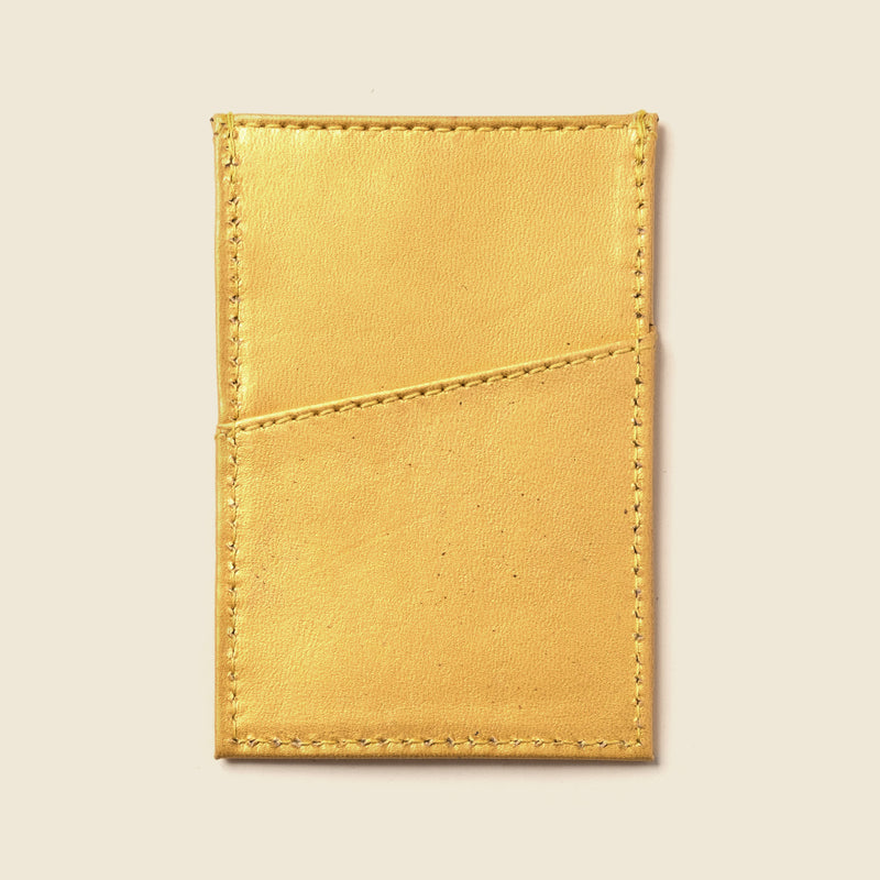 Yellow minimalist cardholder for women. Metallic yellow leather wallet with 3 pockets