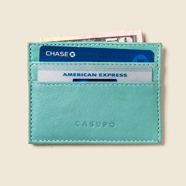 Pastel blue leather cardholder for women. Small and thin RFID wallet with 4 pockets