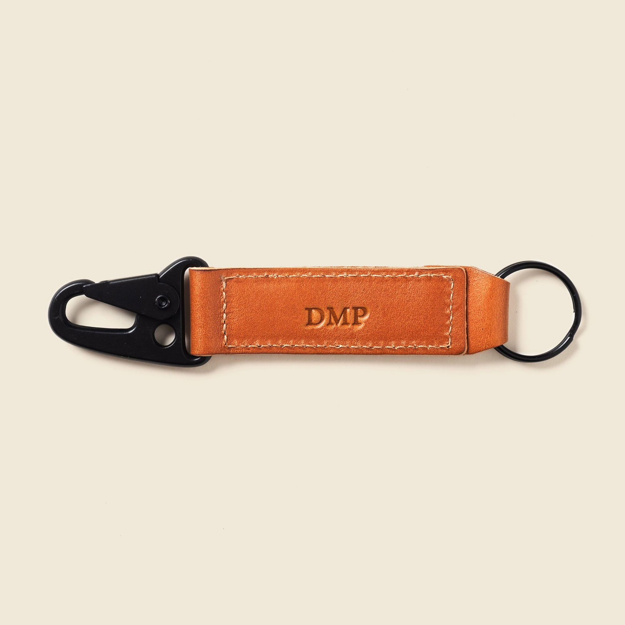 Monogrammed brown leather keychain 